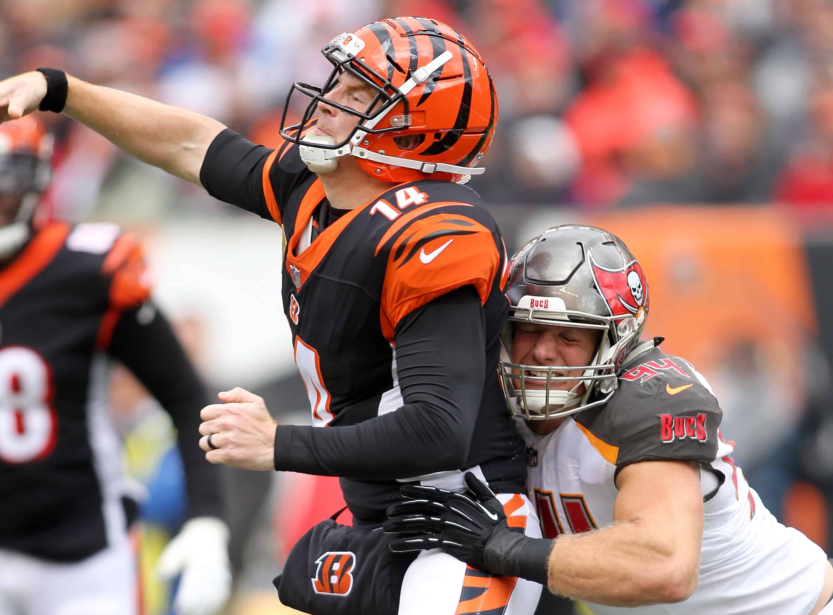 Andy Dalton gets hit by Carl Nassib while attempting a pass