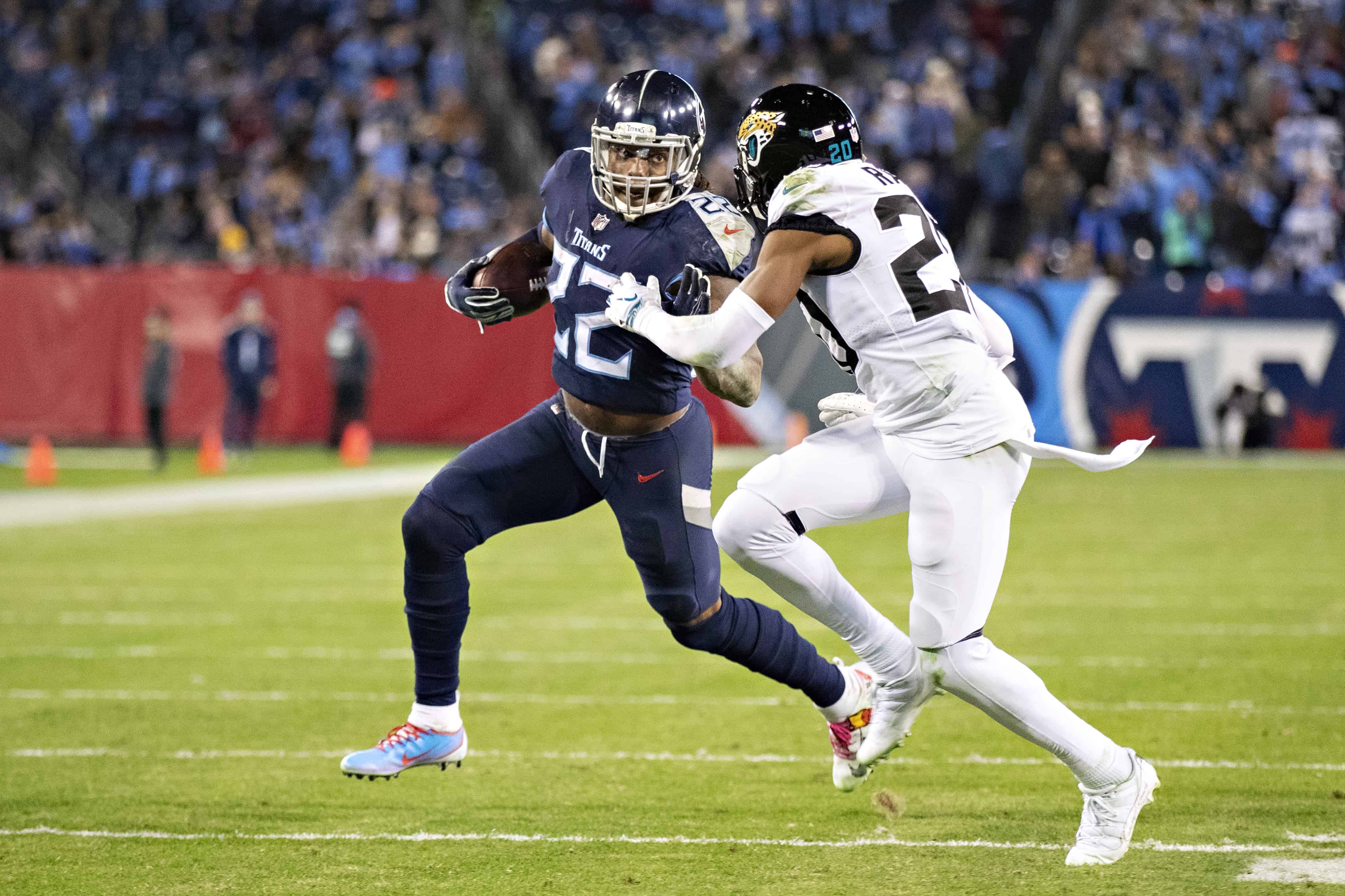 Derrick Henry runs against Jalen Ramsey