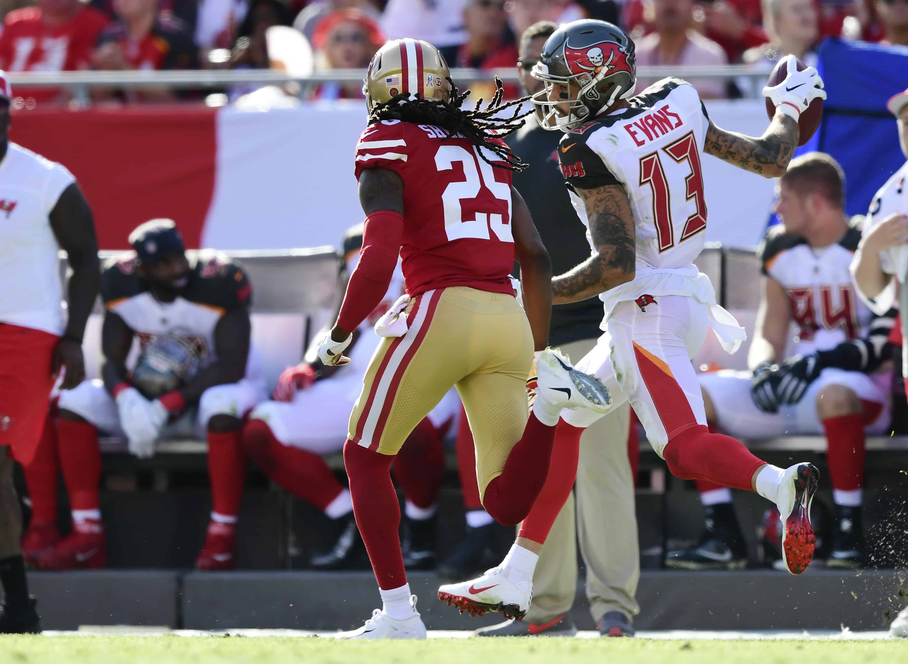 Mike Evans runs from Richard Sherman