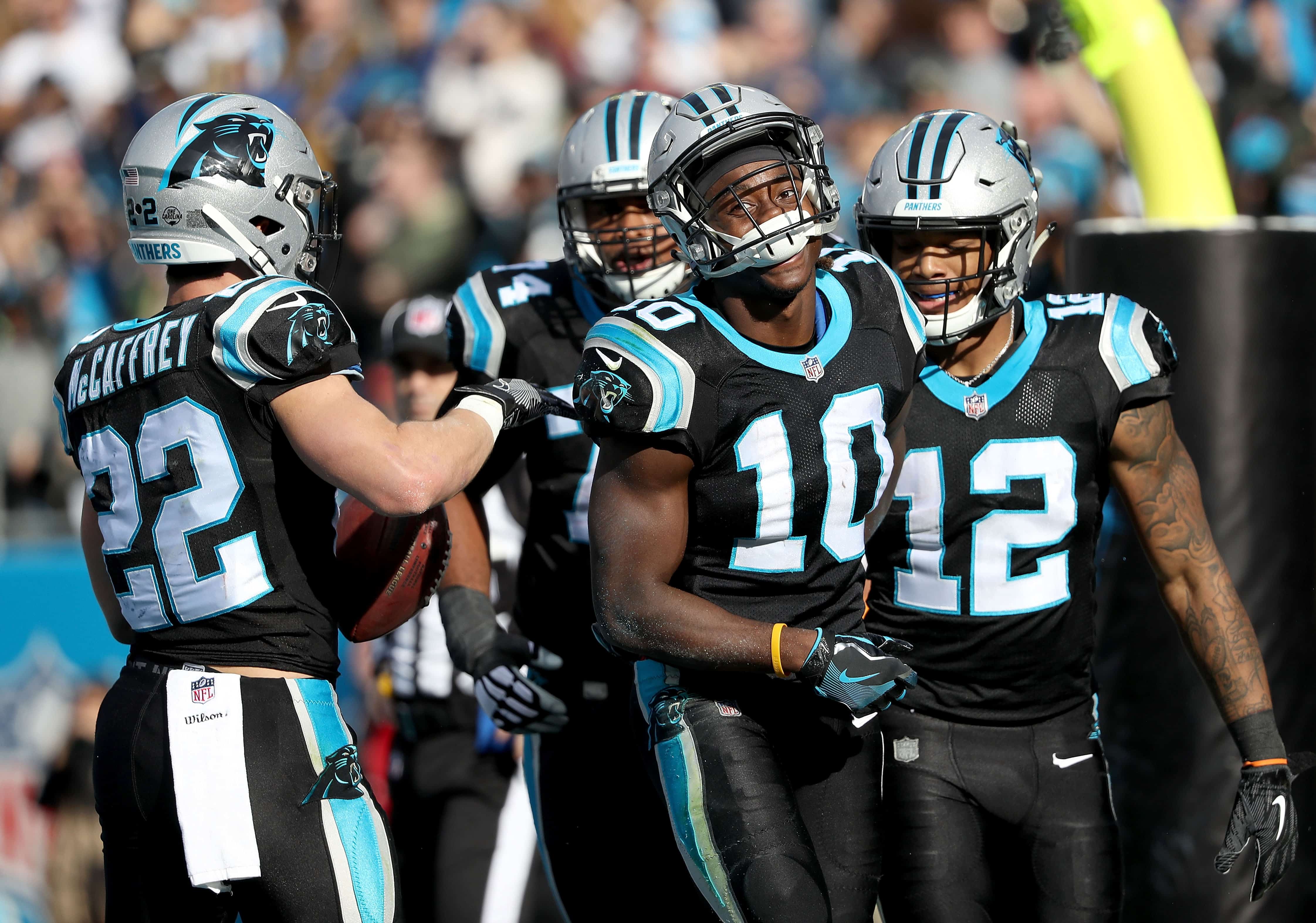 Christian McCaffery, DJ Moore, Curtis Samuel celebrate after touchdown