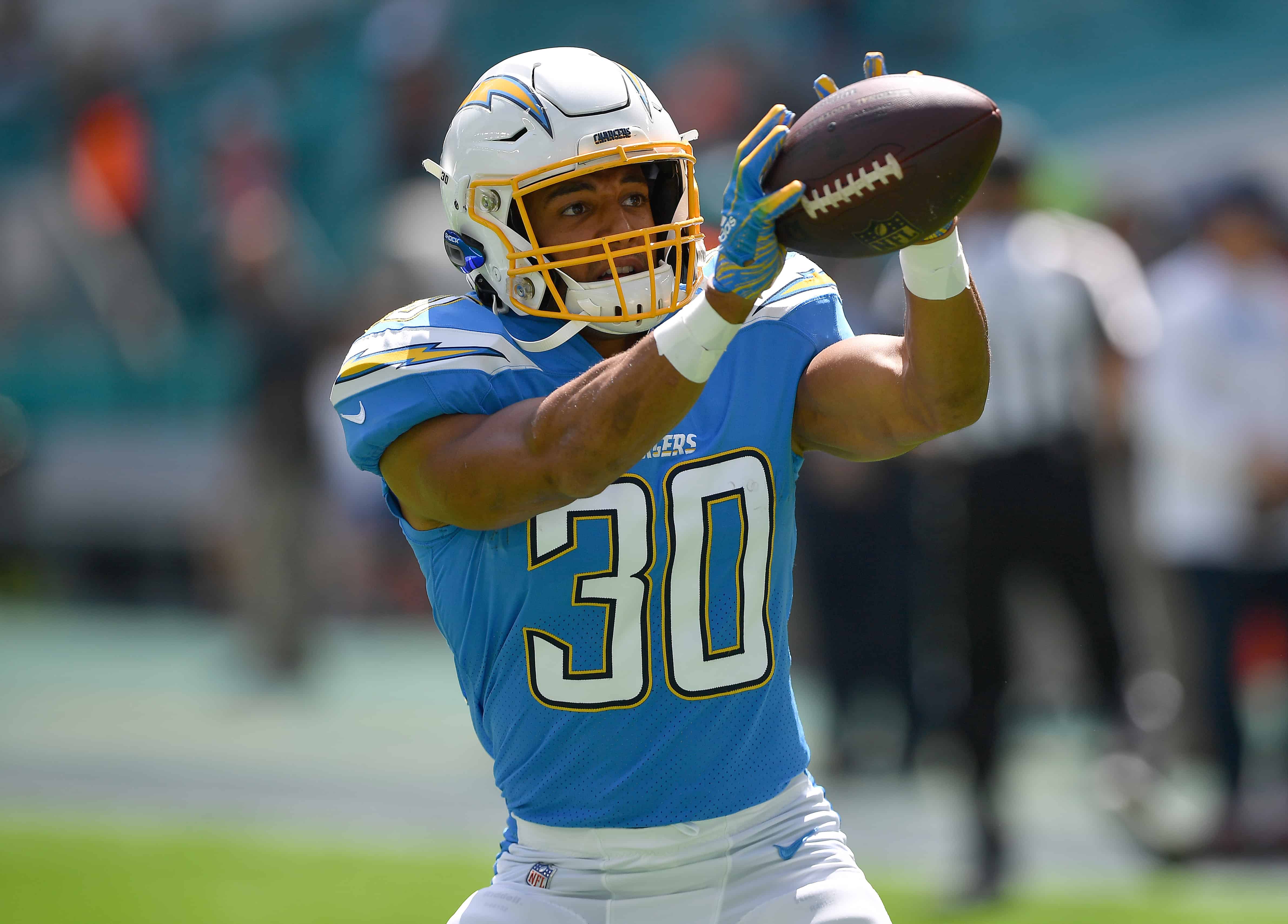 Austin Ekeler catches a pass against Miami