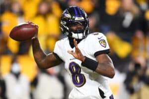 Lamar Jackson winds up to throw.