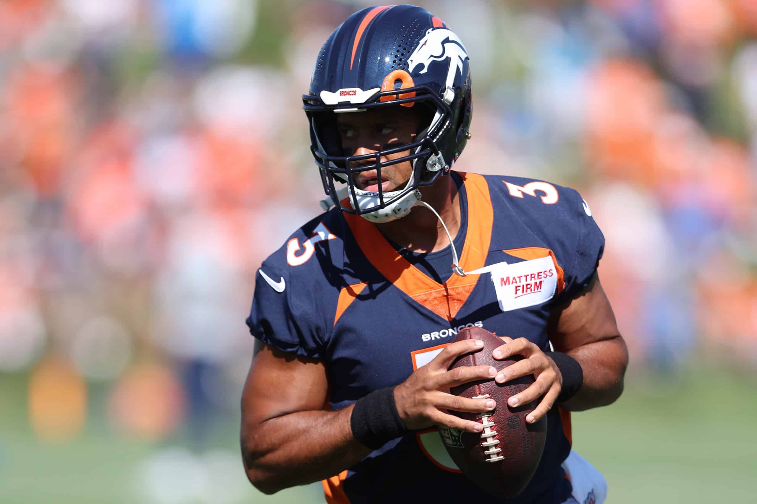 Broncos QB Russell Wilson up-and-down in preseason debut