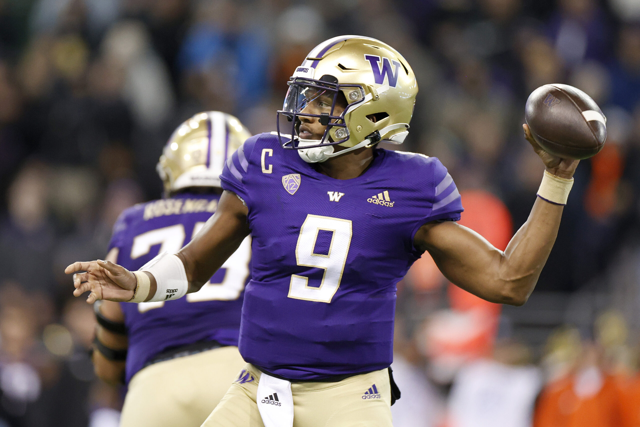 Michael Penix throws a pass.