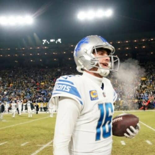 Jared Goff #16 of the Detroit Lions celebrates after defeating the Green Bay Packers