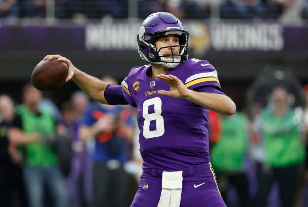 Kirk Cousins throws pass.