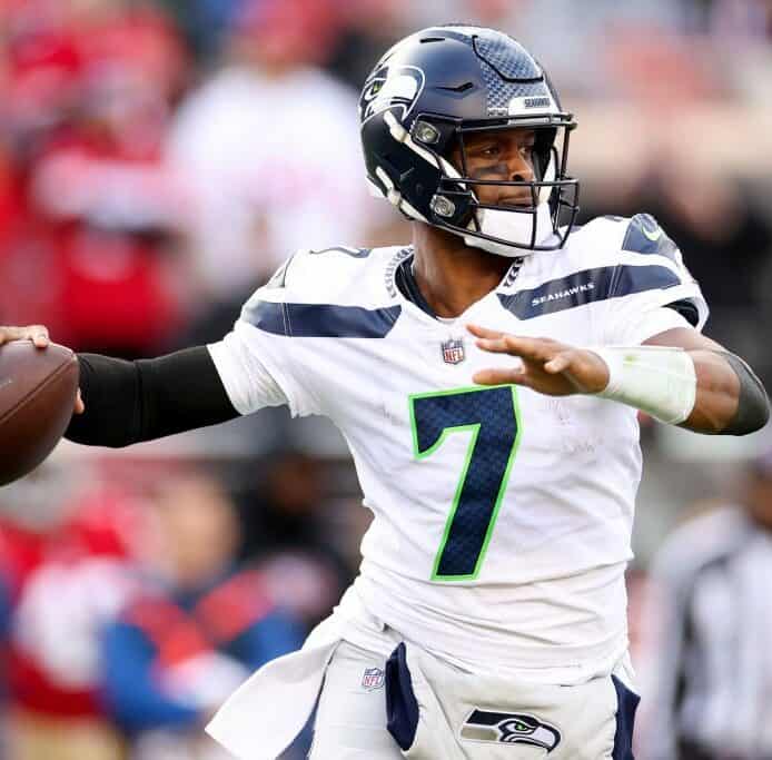 Geno Smith throws a pass