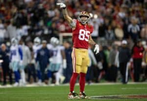 George Kittle celebrates a catch.
