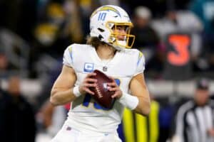Justin Herbert drops back to throw