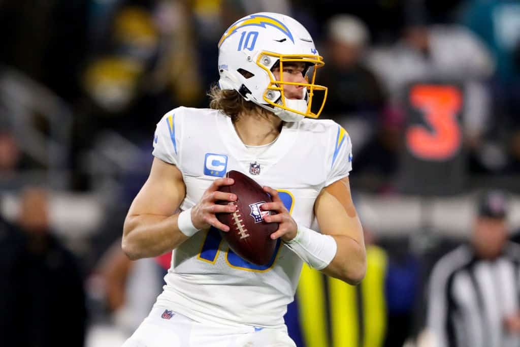 Justin Herbert drops back to throw