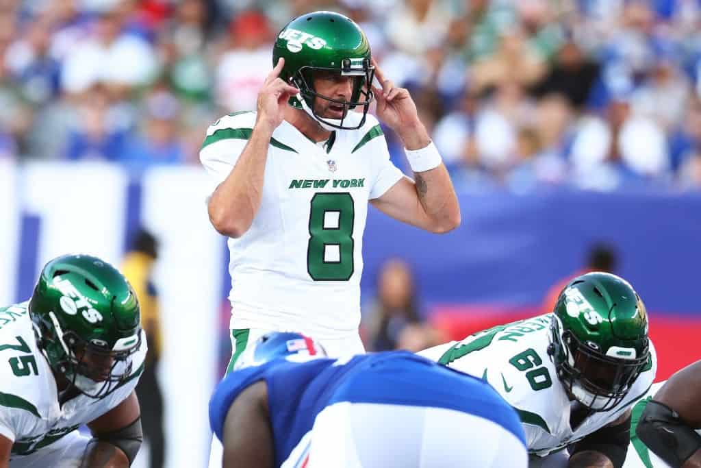 Aaron Rodgers makes a call at the line.