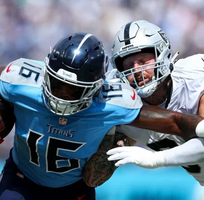 Treylon Burks breaks a tackle.