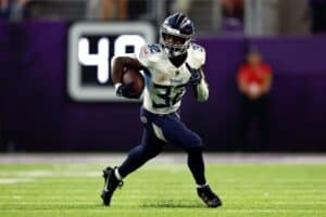 Tyjae Spears runs in the preseason.
