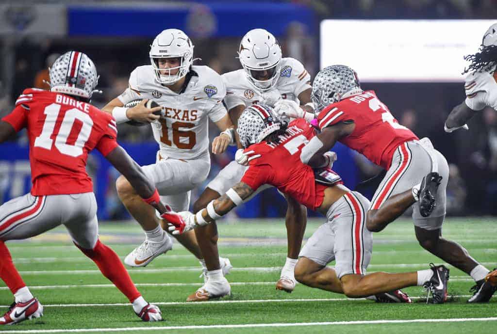 Arch Manning scrambling against Ohio State