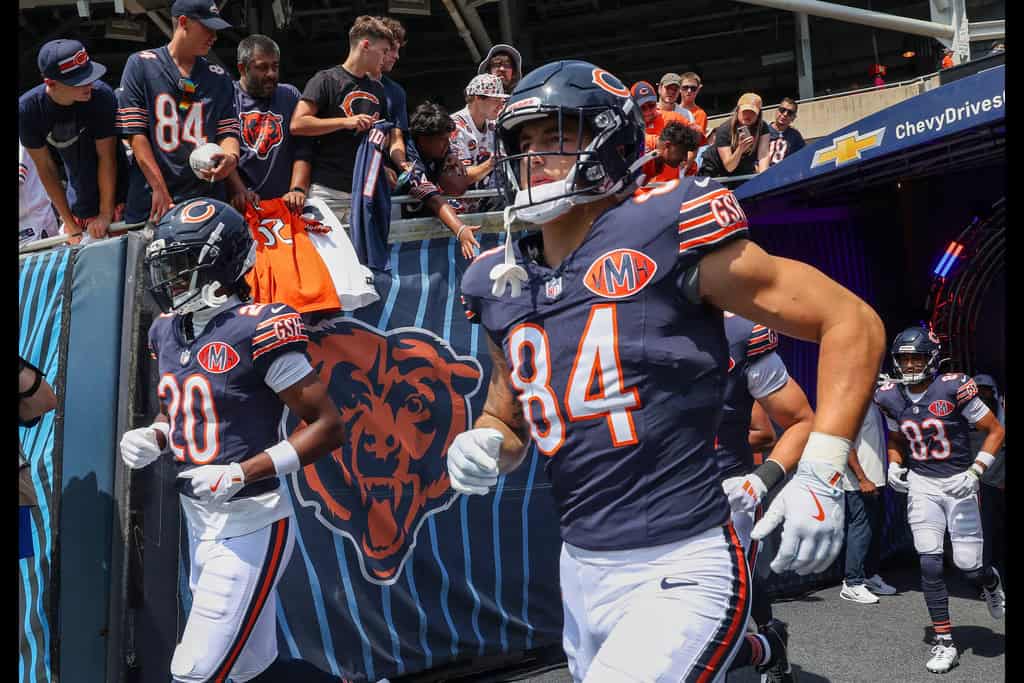 Chicago Bears tight end Colston Loveland runs out onto the field before an NFL preason game