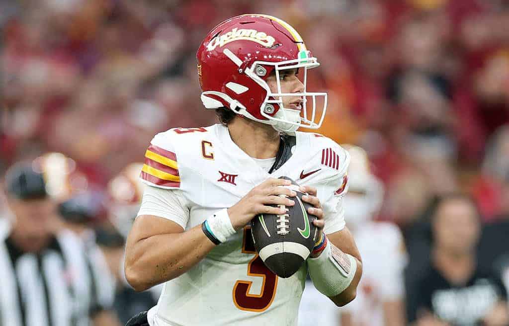 Rocco Becht drops back to pass for Iowa State