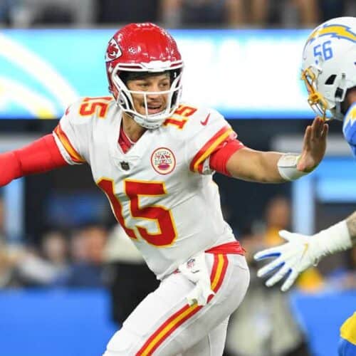 Patrick Mahomes avoids a Chargers defender as he scrambles from the pocket