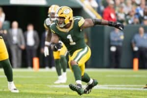 Micah Parsons rushing the quarterback for his new team the Green Bay Packers
