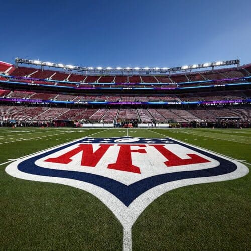 NFL logo at midfield inside an empty stadium ahead of the 2026 NFL schedule release